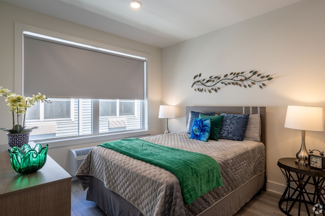 Spacious bedroom with queen bed and blackout blinds at 127 The View apartments